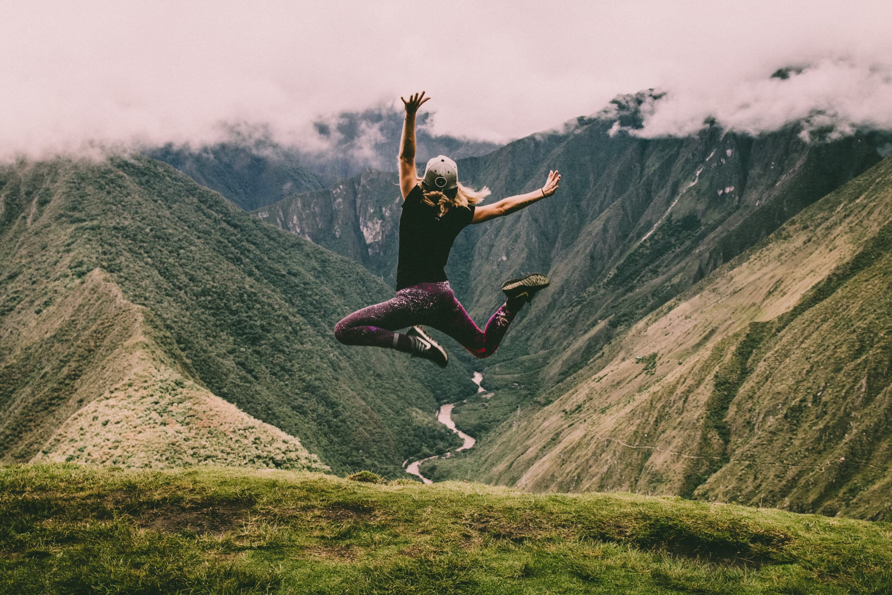 Woman on mountain peak